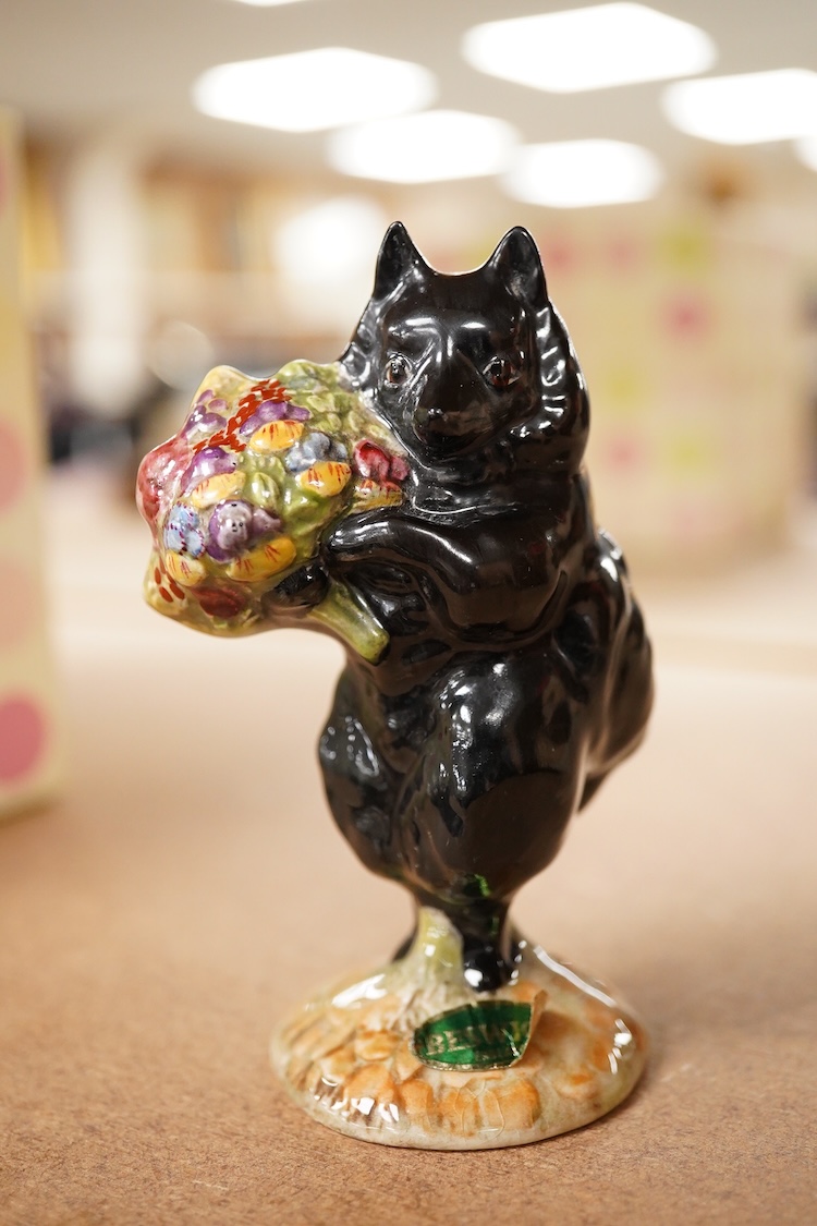 A Beatrix Potter, stamped F Warne and Co Ltd, Beswick figure of “Duchess” with flowers,10cm high